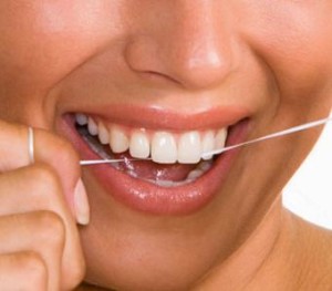 Flossing teeth for a healthy smile